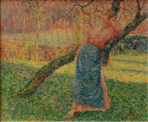 Vrouw in een boomgaard