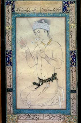 Een jonge man met boeken en narcissen Perzische miniatuur bij gouache van Muhammad Shaykh