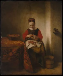 Jonge vrouw schilt appels