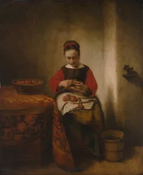 Jonge vrouw schilt appels