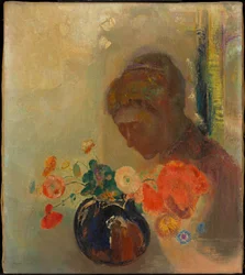 Vrouw met een vaas bloemen
