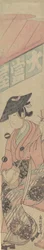 Een geisha zittend op een shogi voor een theehuis
