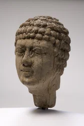 Hoofd van een man (hout)