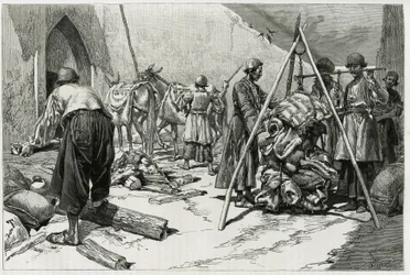 Het wegen van de bagage voor vertrek van de Delafoy Bruiloft Expeditie. Gravure door Tofani, ter illustratie van het verhaal 