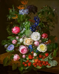 Een mand met rozen en andere bloemen