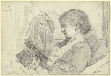 Luise Scholderer zit te lezen met een kat