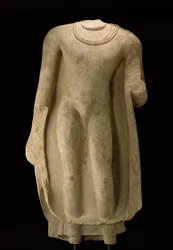 Staande figuur van de Boeddha (hoofd ontbreekt), Gandhara