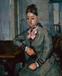 Madame Cézanne leunend op een tafel, ca. 1873