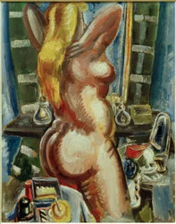 Staande naakt voor de spiegel