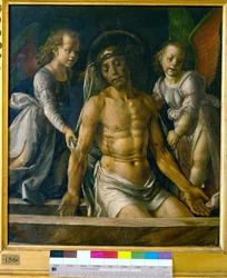 Christus in het graf tussen twee engelen