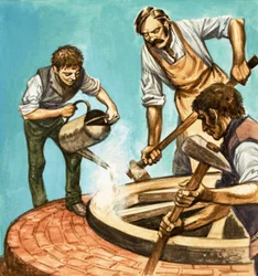 Er was eens... dorpsleven honderd jaar geleden. Wagenmakers zetten de ijzeren rand op een wiel