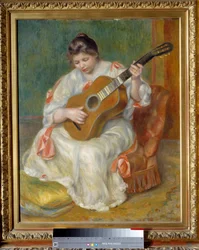 Vrouw die gitaar speelt