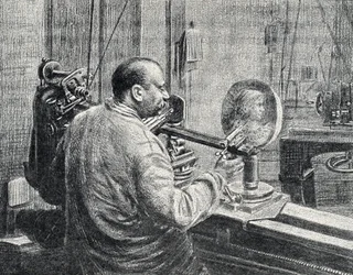 Een medailleur die een soort pantograaf freesmachine gebruikt. Gravure uit 