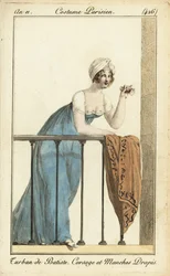 Vrouw op het balkon in het theater met operakijker
