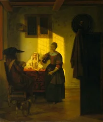 Een stel dat kaarten speelt, met een dienstmeid