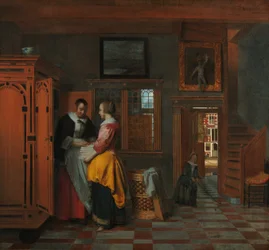 Interieur met vrouwen naast een linnenkast