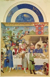 De hertog van Berry aan tafel in de maand januari