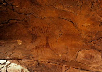 Prehistorie: muurschildering. Steentijd 5000-2000 v.Chr. Taghit, Haut plateau du Hoggar (Ahaggar), Algerije