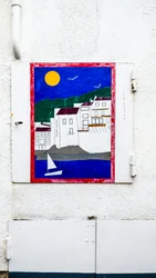 Schilderij op de deur van een water- en elektriciteitsmeter.
Cadaques, 2018 (foto)