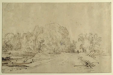 Kanaal met boten, een dijkweg en bomen