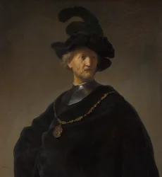 Oude man met gouden ketting
