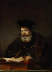Geleerde aan zijn schrijftafel