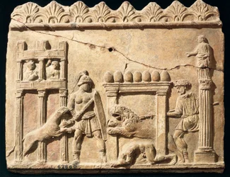 Romeins reliëf met leeuwen en gladiatoren die vechten in het circus