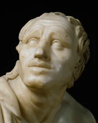 Romeinse kunst: “Een scherper die zijn messen slijpt” Detail van zijn gezicht. Romeinse marmeren sculptuur uit de 1e eeuw v.Chr. naar een Grieks origineel. Dim. 105 cm Florence, Galleria degli Uffizi, Tribuna