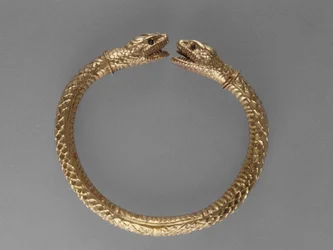 Slangenarmband, AD 1-100 (goud met groene glazen ogen)