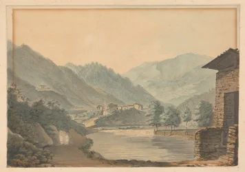Bergachtig landschap met gebouwen en rivier