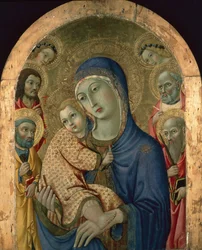De Madonna en Kind met heiligen en engelen