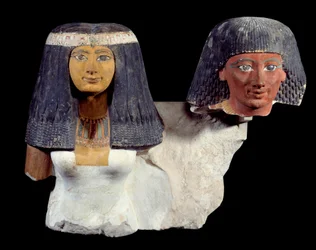 Kunst van het oude Egypte: Senynefer en zijn vrouw Hatsjepsoet (1410 v.Chr.). Beeldhouwwerk van de 18e dynastie nieuw rijk