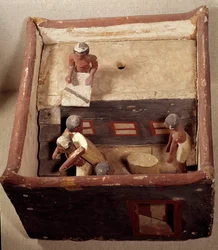 Egyptische oudheid: zoldermodel met schrijvers die de graanprijs registreren. Gemaakt van beschilderd hout. 12e dynastie, Middenrijk. Uit Assiut. Louvre Museum, Parijs