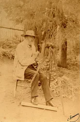 Portret van de dichter Yakov Petrovich Polonsky aan de ezel