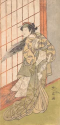 De eerste Nakamura Tomijuro als een boze vrouw die in een kamer staat