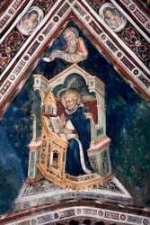 Zicht op het detail van een fresco dat een van de gewelven van de Bovenkerk decoreert en de vier dokters van de Romeinse Kerk voorstelt: Sint Augustinus van Hippo en de evangelist Sint Johannes. Klooster van Sint Benedetto (Sacro Speco), Subiaco (Rome), It