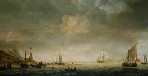 De kust bij Scheveningen met vissers op het strand