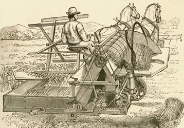 Een oogstmachine, getrokken door paarden, die de schoven mechanisch bond, gebruikt in de late 19e eeuw. Uit El Museo Popular gepubliceerd in Madrid