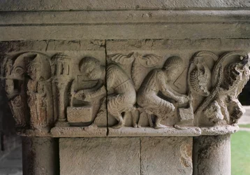 Detail van een kapiteel met steenhouwers aan het werk