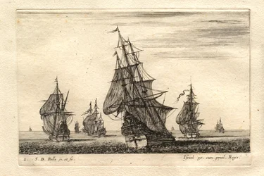 Een boot onder volle zeilen omringd door andere boten