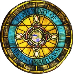 Een ronde loodglas raam door Tiffany Studios