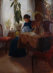 Interieur met vrouw die naait