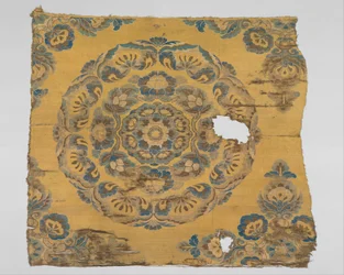 Textiel met bloemmedaillon