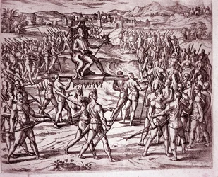 De Inca-koning, Atahualpa (of Atabaliba), met een scepter in de vorm van een zon, wordt op een draagstoel gedragen om Francisco Pizarro te ontmoeten (gravure)