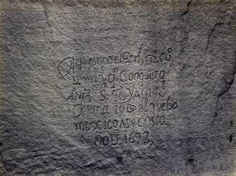 Historisch Spaans verslag van de verovering, zuidkant van Inscription Rock, New Mexico
