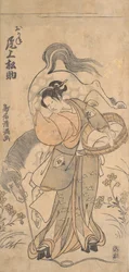 De acteur Onoe Matsusuke in de rol van de beroemde sterke vrouw Okane