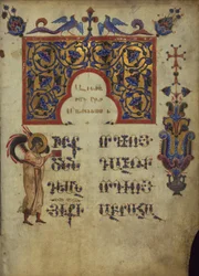 Versierde initiaal met symbool van evangelist Mattheüs