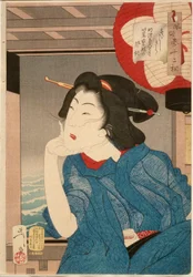 Koel: een geisha uit het midden van de jaren 1870 zittend in een boot