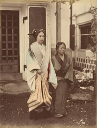 Dame en bediende, 1870s