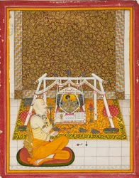 Priester bij een Krishna-heiligdom